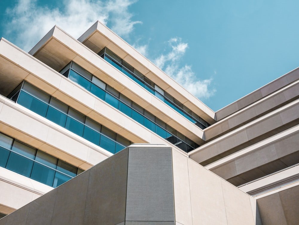 Stepped concrete floors with ribbon windows against a blue sky
